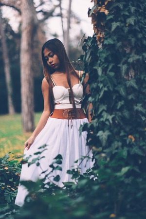 Beautiful wiccan girl, guardian of the mystical forestの写真素材