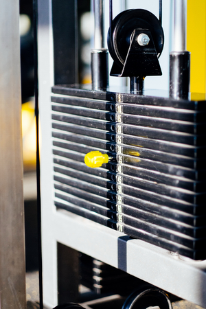 Fitness gym, detail of the lot machine, weights level