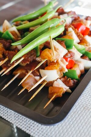 Raw skewers ready for grilling. Selective focusの写真素材