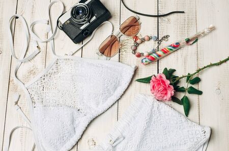 Fashion Summer girl clothes Set with camera and Accessories. summer Outfit.Trendy fashion Sunglasses, flowers. Summer lady Essentials. Creative Design. Fashion Urban Conceptの写真素材