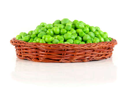 fresh green peas in the pod isolated on white backgroundの写真素材