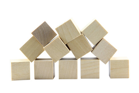 wooden toys, square wooden blocks isolated on white background with clipping path.Selection focus.の写真素材