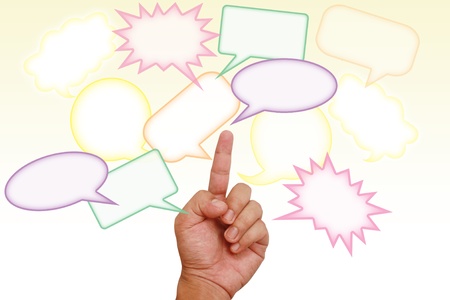 Hand pointing on colorful blank messageの写真素材