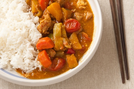 Delicious pork curry served with hot Thai jasmine riceの写真素材