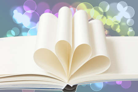 Blank notebook on beautiful light bokeh background
