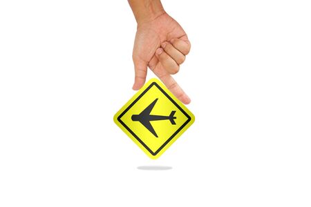 Hand hold airplane sign with shadowの写真素材