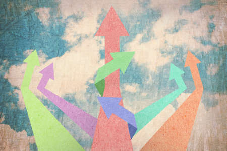 Arrow up created from textured paper style on sky vintage background 