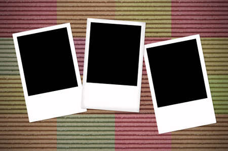 Blank photo frame on color paper background