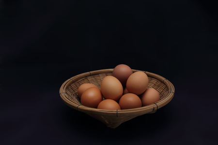 eggs in bamboo basket 01の写真素材