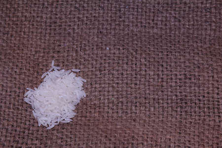 stack of rice on sackの写真素材