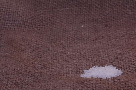 stack of rice on sackの写真素材