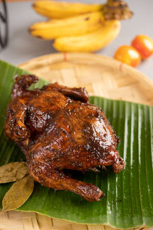 A Filipino dish called "Lechon Manok.  This is a roasted chicken seasoned with citrus, soy sauce, vinegar, etc.の写真素材