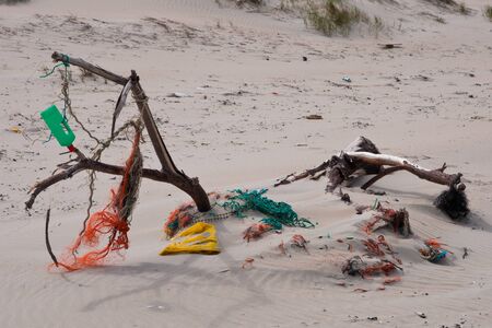 Litter washed ashore on Texel Netherlandsの写真素材