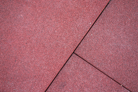 Red bright synthetic texture of foam rubber spongeの写真素材