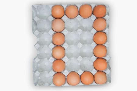 egg in white corrugated tray.の写真素材