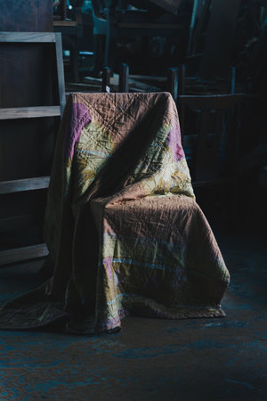 Old chair in a dirty old wooden shed