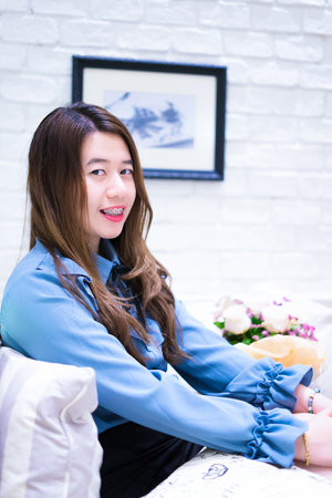 The girl in the blue dress shopの写真素材