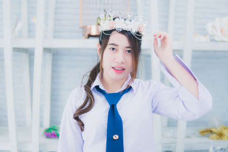 School uniform girl in a coffee shopの写真素材