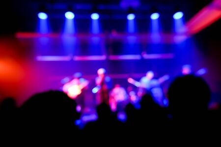Stage, concert light. People are watching a concert , blurの写真素材