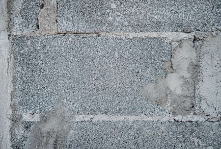 Close up of gray cement block wall for texture and background.の写真素材