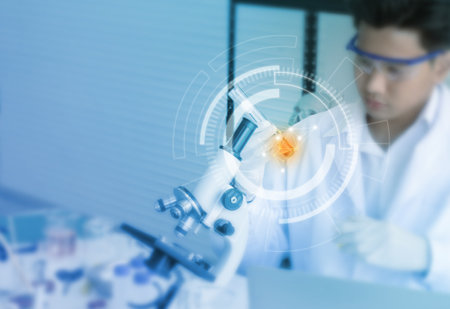 Young scientist use of Dropper and Test Tube with effect technology in the laboratory. illustration science concept.の写真素材
