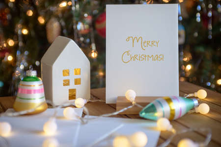 Christmas card with lights and decorationsの写真素材