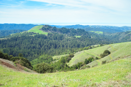 Beautiful scenic view from mountain top, valley in the distance, hiking and travel conceptの写真素材