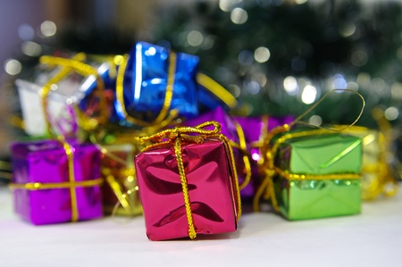 Christmas gift boxes with gold ribbonの写真素材