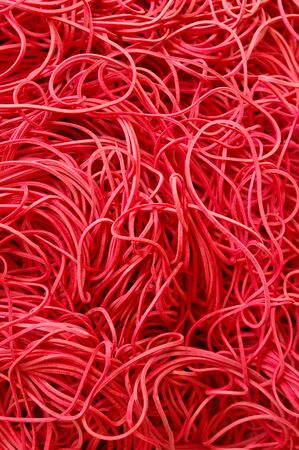 red rubber ribbon backgroundの写真素材