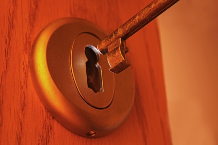 Key and light passing through a keyholeの写真素材