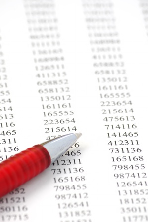 Ballpoint Pen on table with numbersの写真素材
