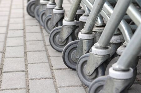 Old shopping carts wheelsの写真素材