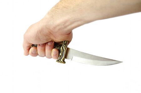 Decorative knife in man handの写真素材