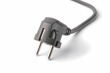 Black electrical plug and electrical cord isolated on white background 
