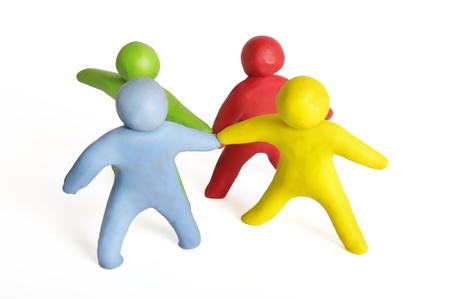 Human figures from plasticine standing in a circleの写真素材