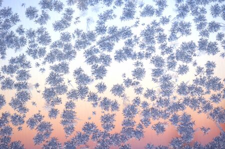 The patterns made by the frost on the window. Morning time.