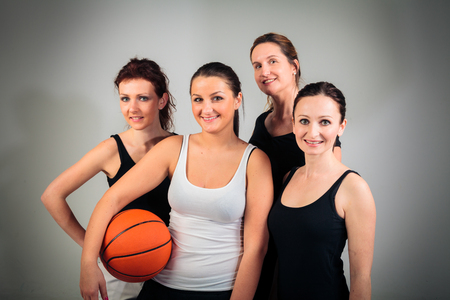 4 Women Playing Basketballの写真素材