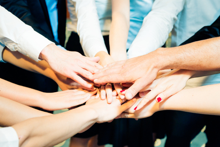 Business Team Holding Their Hands Together