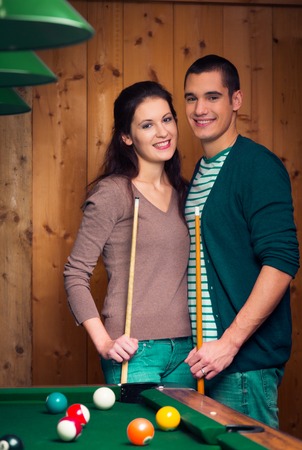 Couple Playing Poolの写真素材