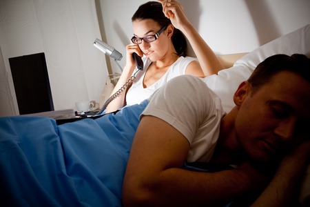 Modern Workaholic Coupleの写真素材