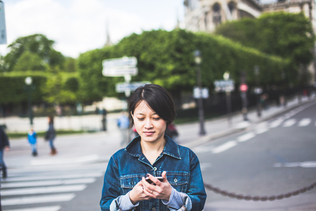 Young Chinese Female Enjoying Her Trip To Parisの写真素材