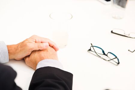 Businessman Sitting At Desk