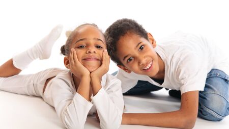 Mixed-race Children Playing On The Floorの写真素材