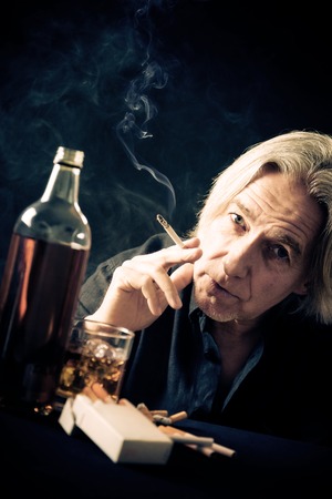 Senior Man Drinking Hardの写真素材