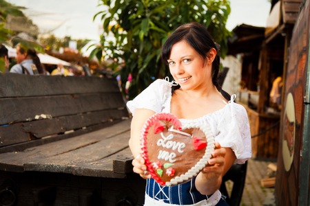 Young German Woman With Gingerbread Heartの写真素材