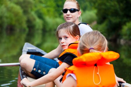 Young Family Canoeingの写真素材