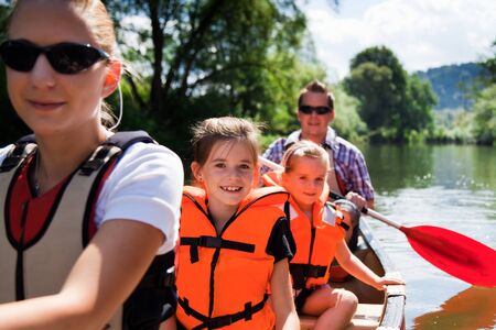 Young Family Canoeingの写真素材