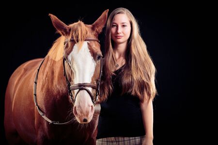 Woman With Her Horseの写真素材