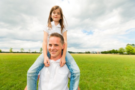 Father And Daughter In The Parkの写真素材