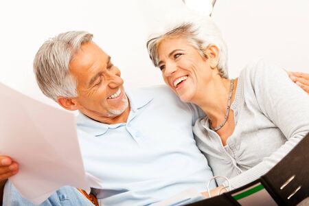 Senior Couple Doing Paperworkの写真素材